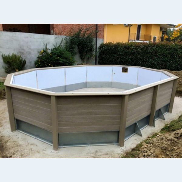 Installazione Piscina Seminterrata effetto legno in pietra ricostruita decagonale allungata NATURALIS 6,35 x 4,72