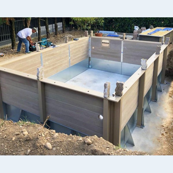 Installazione Piscina in pietra ricostruita effetto legno NATURALIS rettangolare 6,09 x 3,24